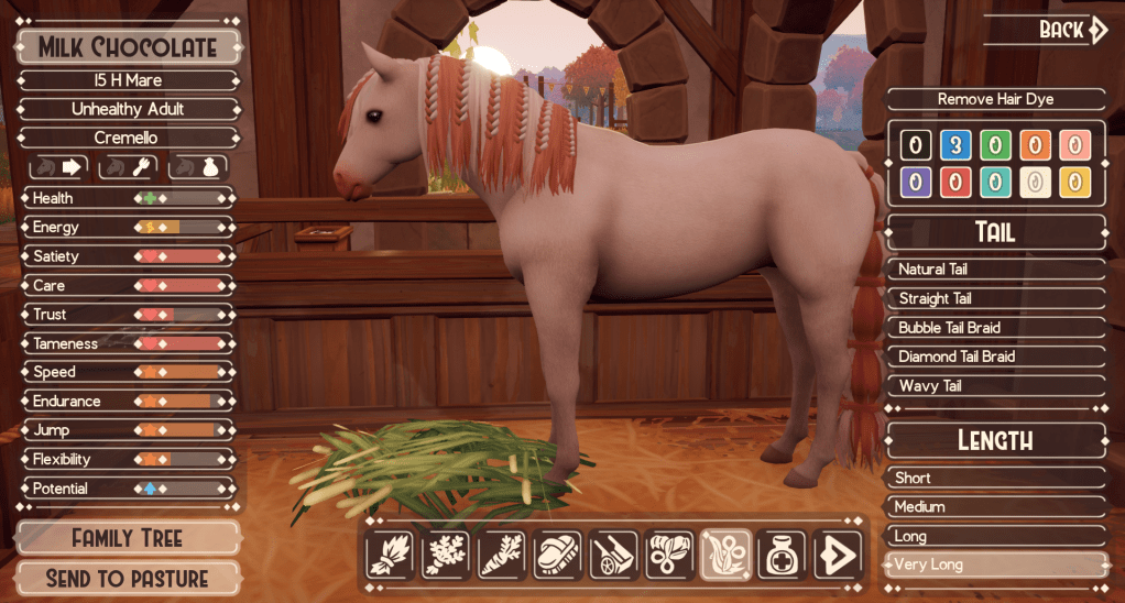 Cremello horse with an orange dyed mane; Main has small braids.